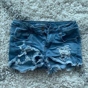 Blue jean ripped shorts